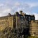 Majestic Edinburgh Castle perched on the edge of a rocky cliff
